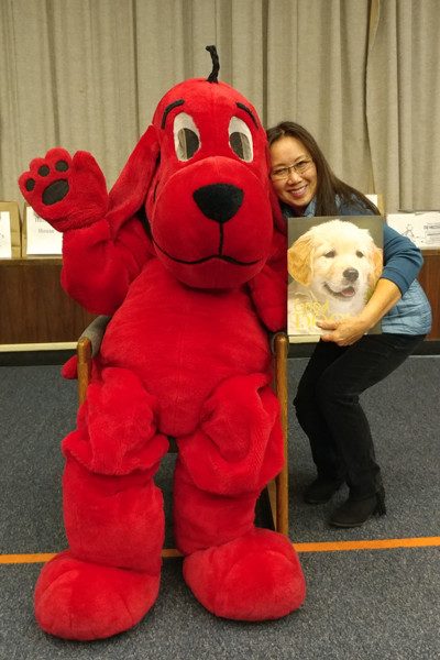 Friend and dog lover Jenlane Gee Matt shares a book about dogs with Clifford.