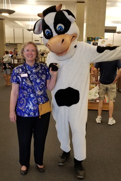 A surprise appearance by a mystery cow made Friend Anne Britton smile.